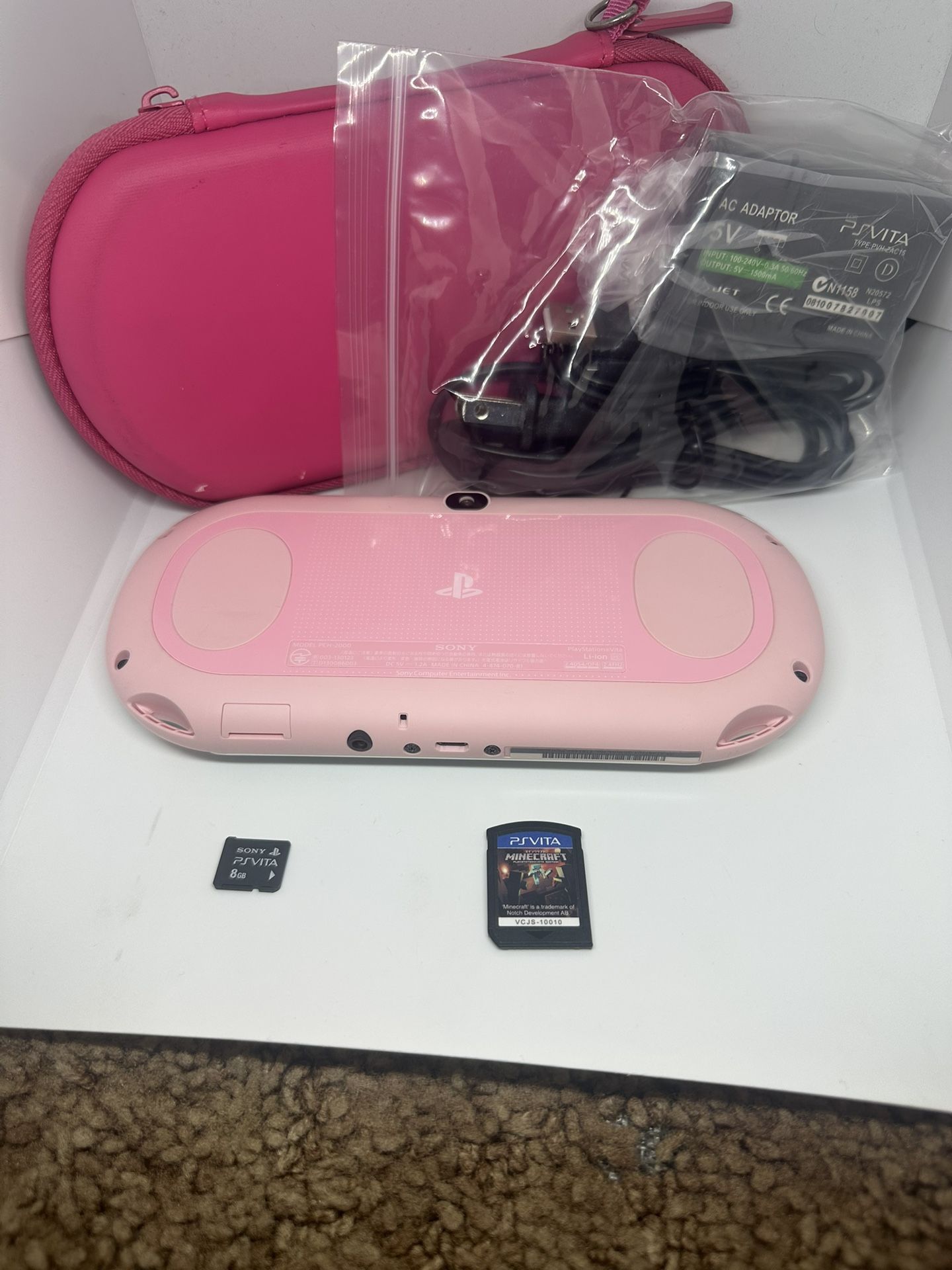 Ps vita 2000 light pink w/accessories