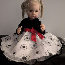 Beautiful Doll. She Is Wearing Pig Tails