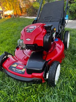 LAWN MOWER RECYCLER  SELF PROPELLED  22” WIDE  190cc SMART STOW  BIG REAR WHEEL  IN GREAT CONDITION  LOOKS LIKE NEW