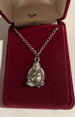 New silver tone Buddha