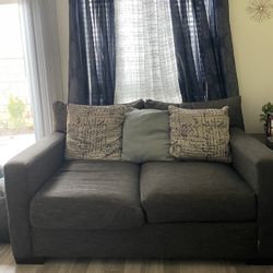 Loveseat with 3 pillows