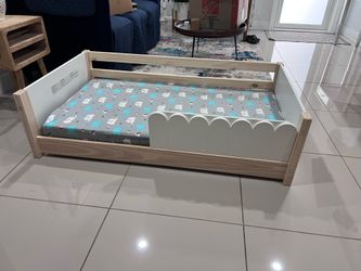 Toddler bed with mattress almost new
