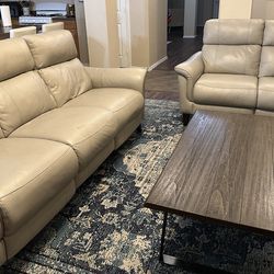 Leather reclining living room set with tables