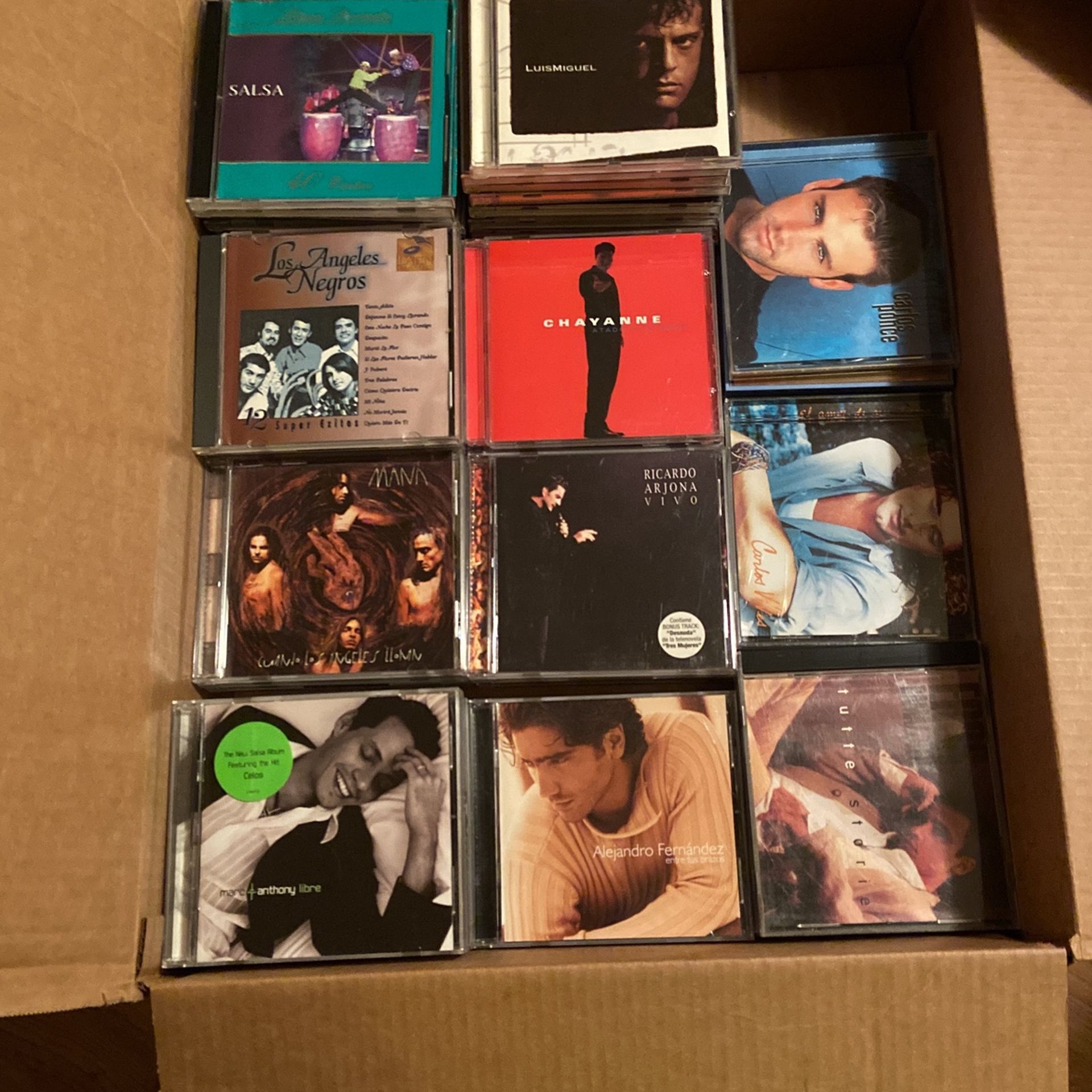 65 CDs En Español