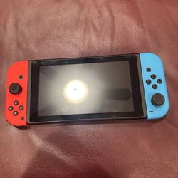 Nintendo Switch with Neon Blue and Red Joy-Con
