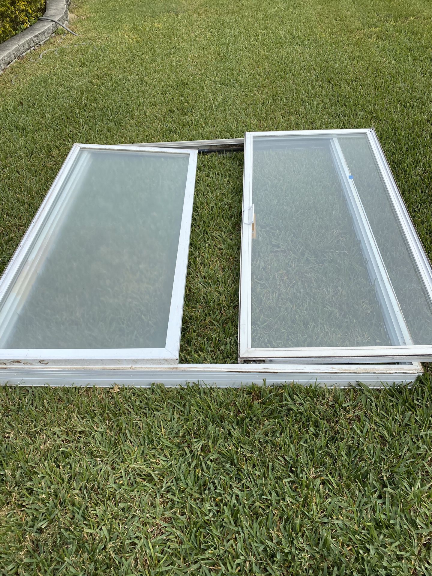Sliding patio door 1 double doors, 80.00 each first will take, clean up the garage