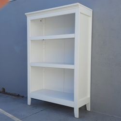 White solid bookshelf