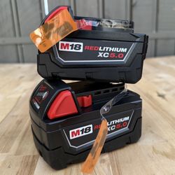 Milwaukee M18 18-Volt Lithium-lon XC Starter Kit with Two 5.0Ah Batteries and Charger