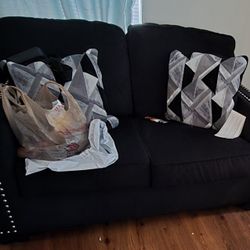 Ashley Furniture Gleston Modern Fabric & Wood Loveseat with Track Arms in Black Sofa