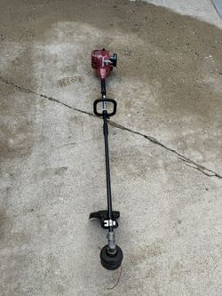 Home light weedeater starts and runs on half choke