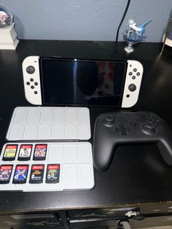 Nintendo Switch OLED with 7 Game & Controller