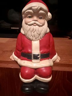 Vintage Christmas ceramic   hand painted Santa Claus sits on a shelf