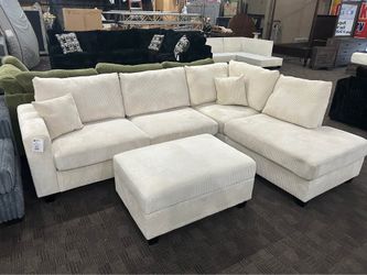 Cream corduroy comfortable sectional w/ storage ottoman
