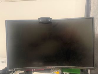 Webcam and 27 inch curved monitor