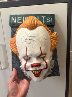 Officially licensed IT Chapter 2 Pennywise wall decoration featuring the Neibolt