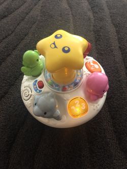 Bright Starts Pop Top Spin toy