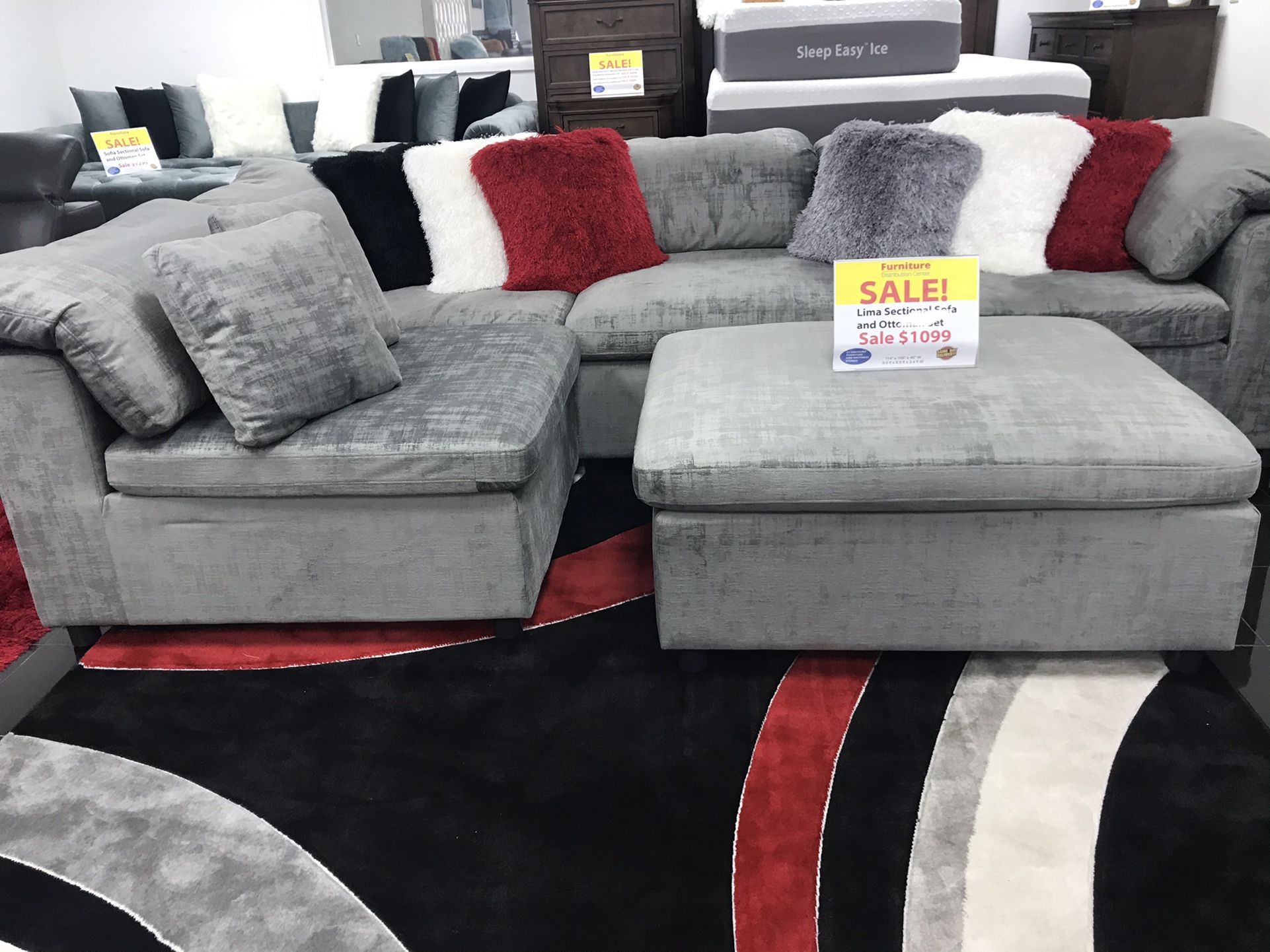 BEAUTIFUL GRAY MODULAR AND OTTOMAN. SAME DAY DELIVERY AND EASY FINANCING .