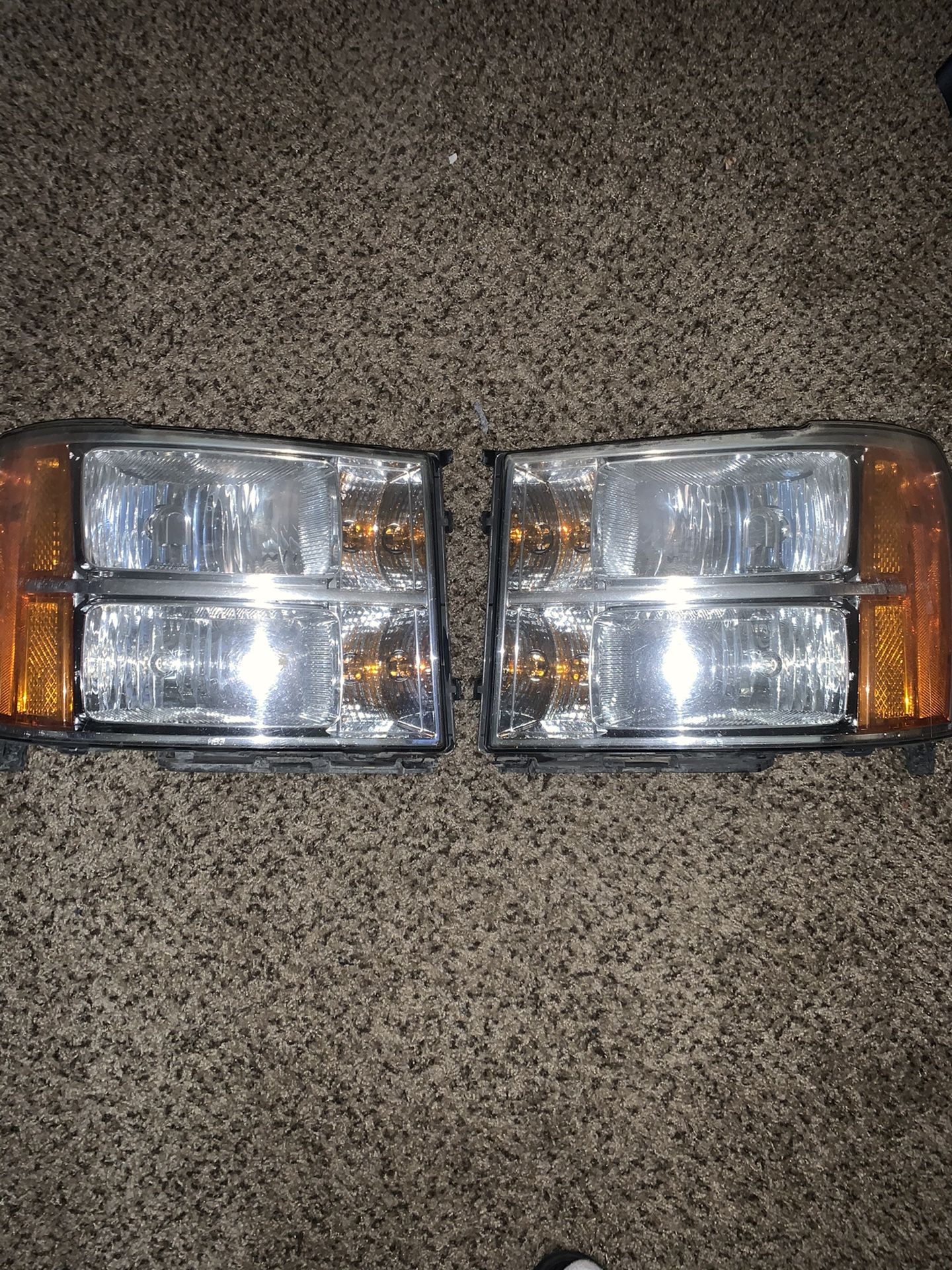 2011 GMC Sierra Headlights