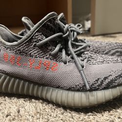 Yeezy Grey And Black W/ Red. 