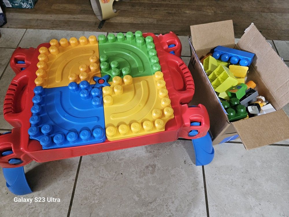 mega block table with box of blocks