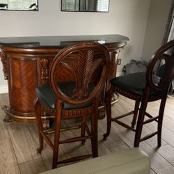 wood stained marbel bar table with chairs 