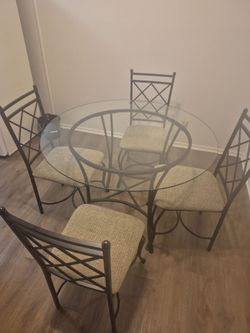Dinning glass table 4 chairs