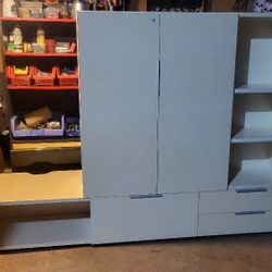 Stack On Storage Cabinet With Hinged Doors And Cubby.