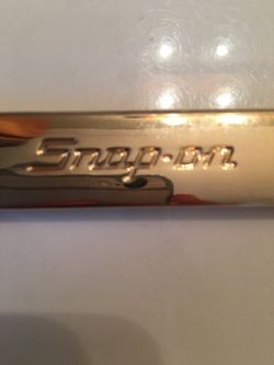 Gold snap on knife