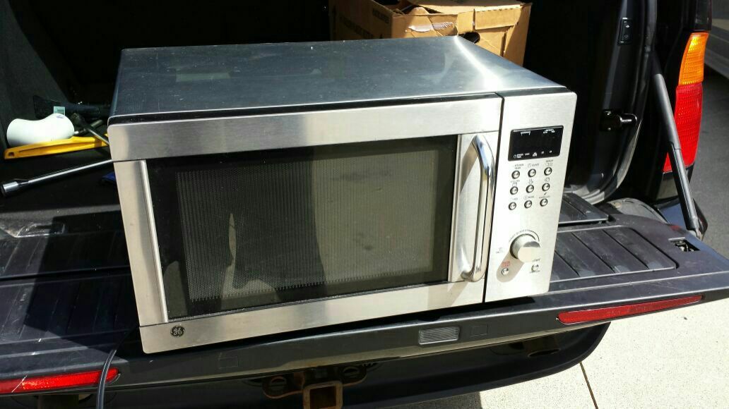 GE Microwave, Brushed Metal Finish Model JES1344SK 05 Measures 15x22x13