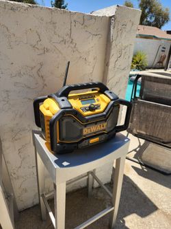 DEWALT Jobsite Bluetooth radio/charger Model: DCRO25, with DEWALT 20V Lithium Battery.