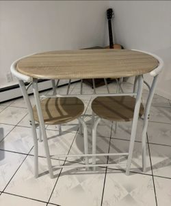 Like new Dining table with 2 high chairs perfect for small living area