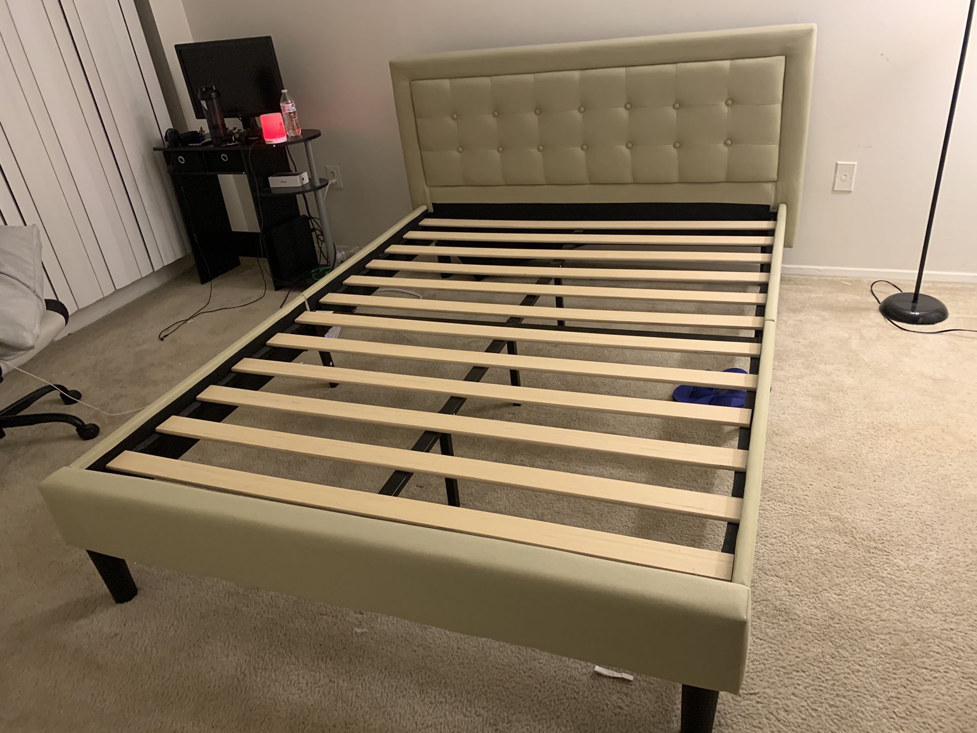 Queen sized Mornington upholstered bed frame with headboard