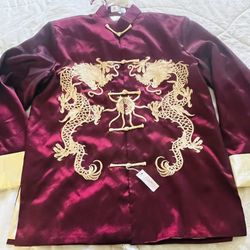 traditional Chinese men's jacket, also known as a changshan or tang suit, in a burgundy or red color with gold dragon embroidery and frog closures. 