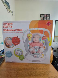 Bright Starts Comfy Baby Bouncer Soothing Vibrations Infant Seat - Taggies, Music, Removable -Toy Bar, 0-6 Months Up to 20 lbs (Whimsical Wild