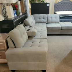 Reversable Gray Sectional with Drop-Down 2 Cup Holders