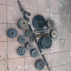 Weights 1” opening 260lbs weights, (2) dumbbell bars, (1) long bar