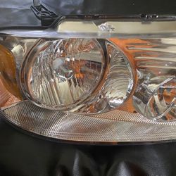 New In Box Ford F-150 Headlight Assembly 