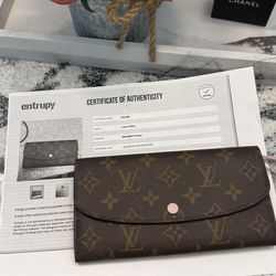Authentic Louis Vuitton Emilie Wallet check more pictures