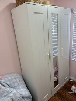 Ikea closet with mirror