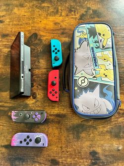 Nintendo Switch Console with Joy-Cons and Pokémon Case