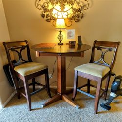 Beautiful Bar Height Table And Two Chairs