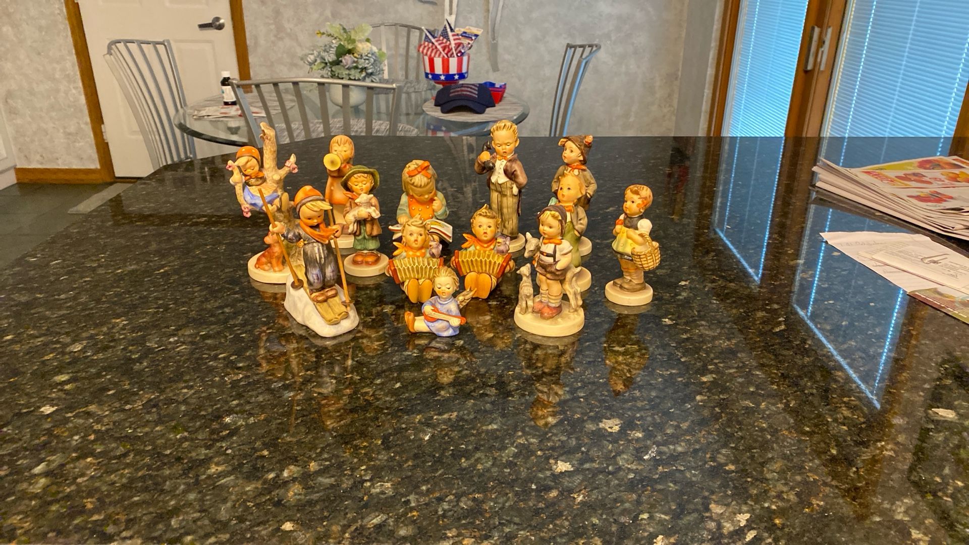 13 Hummel figurines