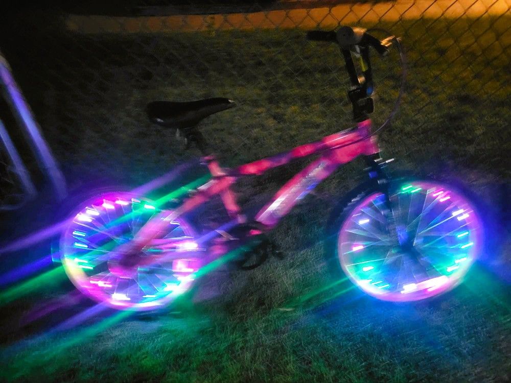 20 inch BMX bike with lighted rims - Dual hand brakes - Like new