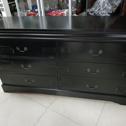 Black wood chest dresser (tape on drawers)