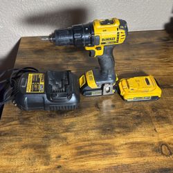 Dewalt drill comes with two batteries and a charger