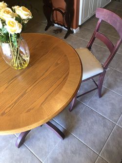 Wood pub table with mauve legs and chairs