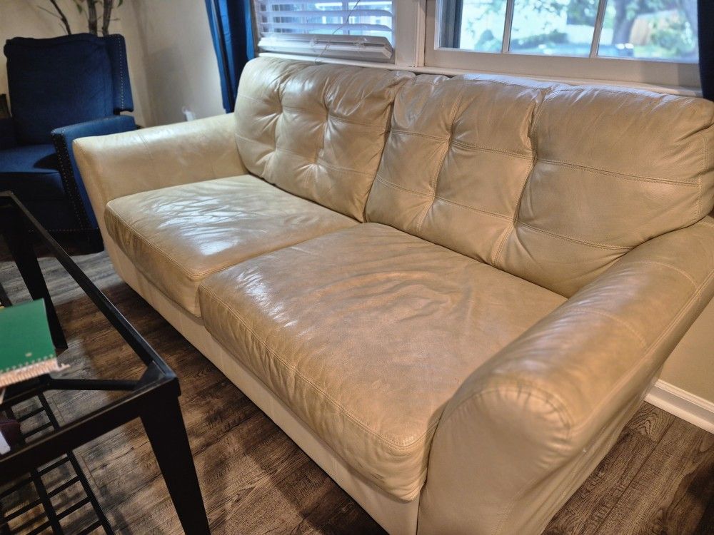 Beige faux leather sofa (two matching, or one)