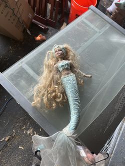 Mermaid Dressed In This Beautiful Light Blue Head Band  