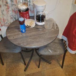 Small Table And Matching Chairs