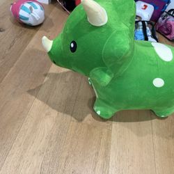 I play Bouncy Dinosaur Plush